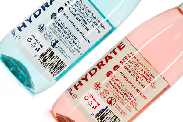 Good To Go Hydrate Cherry and Blue Raspberry bottles – angled view